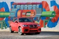 BMW X6 M rouge 3/4 avant droit