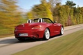 BMW Z4 3.5is rouge 3/4 arrière droit travelling penché