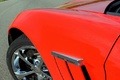 Chevrolet Corvette C6 Grand Sport rouge aile avant debout