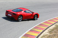 Ferrari 458 Italia - rouge- dynamique, sur circuit