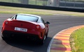 Ferrari 599 GTO - rouge/noir - 3/4 arrière droit, sur piste