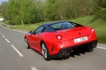 Ferrari 599 GTO - rouge/noir -  3/4 arrière gauche, dynamique