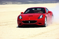 Ferrari California rouge 3/4 avant gauche travelling