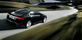 Jaguar XFR noir 3/4 arrière droit travelling