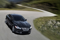 Jaguar XFR noir 3/4 avant droit travelling