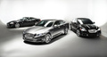 Jaguar XJ gris & XKR noir & XFR noir 3/4 avant gauche