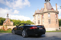 Jaguar XKR Cabriolet noir 3/4 arrière gauche