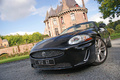 Jaguar XKR Cabriolet noir 3/4 avant gauche penché