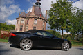 Jaguar XKR Cabriolet noir profil capotée penché
