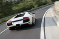 Lamborghini Murcielago LP640 blanc 3/4 arrière droit travelling penché