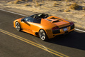 Lamborghini Murcielago LP640 Roadster orange 3/4 arrière gauche filé vue de haut