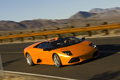 Lamborghini Murcielago LP640 Roadster orange 3/4 avant droit filé penché