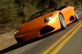 Lamborghini Murcielago LP640 Roadster orange 3/4 avant gauche travelling penché