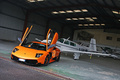 Lamborghini Murcielago LP670-4 SV orange 3/4 avant gauche penché avion