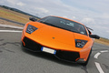 Lamborghini Murcielago LP670-4 SV orange face avant penchée travelling
