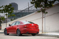 Lexus IS-F rouge 3/4 arrière gauche