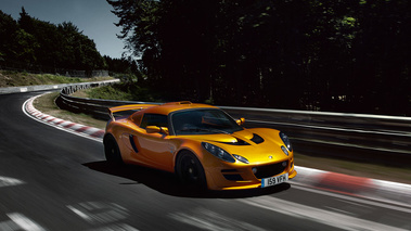 Lotus Exige S orange 3/4 avant droit travelling