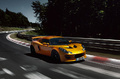 Lotus Exige S orange 3/4 avant droit travelling