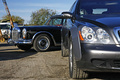 Maybach 62 grise/anthracite casse face avant coupé & Mercedes 600 LWB noir 3/4 avant gauche