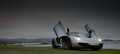 McLaren MP4-12C gris 3/4 avant droit portes ouvertes