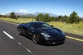 McLaren MP4-12C noir 3/4 avant doir travelling