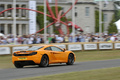 McLaren MP4-12C orange Goodwood 3/4 arrière droit filé