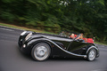 Morgan Aero 8 noir autoroute 3/4 avant gauche travelling penché 2