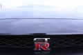 Nissan GTR noir logo calandre