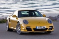 Porsche 911 Turbo 2009 - jaune - 3/4 avant droit