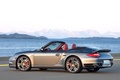 Porsche 911 Turbo cabrio 2009 - grise - 3/4 arrière gauche