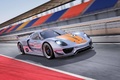 Porsche 918 RSR gris/orange 3/4 avant droit travelling penché