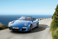 Porsche 997 Carrera 4 GTS - Cabriolet bleu - 3/4 avant gauche, dynamique
