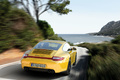 Porsche 997 Carrera 4 GTS - Coupé jaune - 3/4 arrière droit, dynamique