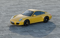 Porsche 997 Carrera 4 GTS - Coupé jaune - 3/4 avant gauche