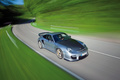 Porsche 997 GT2 RS gris 3/4 avant droit travelling vue de haut