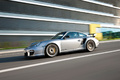 Porsche 997 GT2 RS gris 3/4 avant gauche travelling penché 2