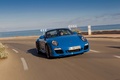 Porsche 997 Speedster bleu 3/4 avant droit travelling penché 2