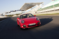 Porsche 997 Turbo Cabriolet MkII rouge face avant travelling penché 2
