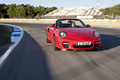 Porsche 997 Turbo Cabriolet MkII rouge face avant travelling
