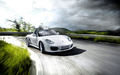 Porsche Boxster Spyder blanc 3/4 avant droit travelling