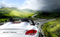 Porsche Boxster Spyder blanc face arrière travelling coupé