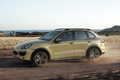 Porsche Cayenne S jaune 3/4 avant gauche travelling