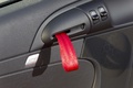 Porsche Cayman R rouge poignée de porte intérieure