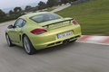Porsche Cayman R vert 3/4 arrière gauche travelling penché 2