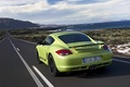 Porsche Cayman R vert 3/4 arrière gauche travelling penché 3