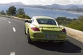 Porsche Cayman R vert 3/4 arrière gauche travelling penché 3