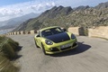 Porsche Cayman R vert 3/4 avant droit travelling penché 5