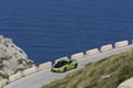 Porsche Cayman R vert 3/4 avant gauche filé vue de haut 3