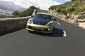 Porsche Cayman R vert face avant travelling penché