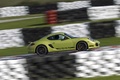 Porsche Cayman R vert filé penché 2